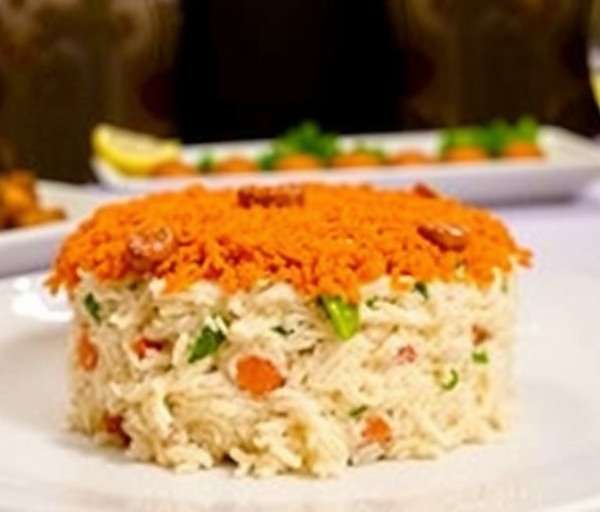 Naan Nirvana - Authentic Hyderabadi Biryani Hyderabadi biryani from Naan Nirvana showing layered rice dish
