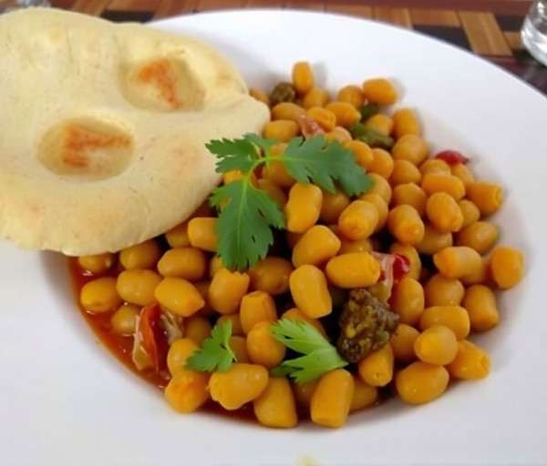 Naan Nirvana - Spicy Punjabi Chole Bhature Punjabi chole bhature from Naan Nirvana showing spicy chickpeas with fried bread